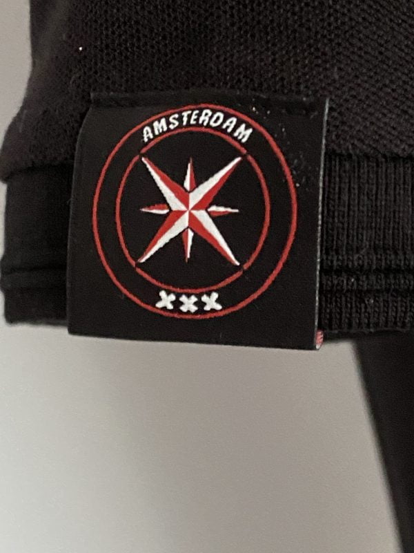 Polo Zwart Amca logo