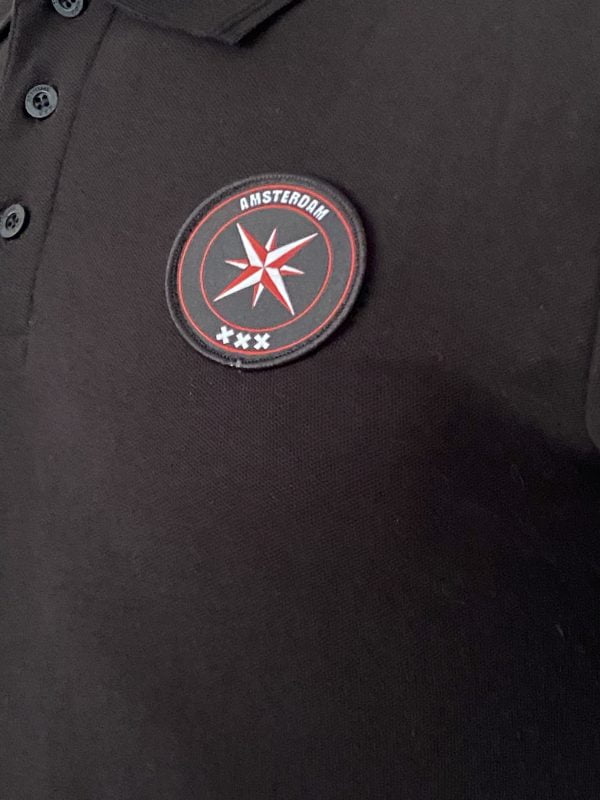 Polo Zwart Amca logo