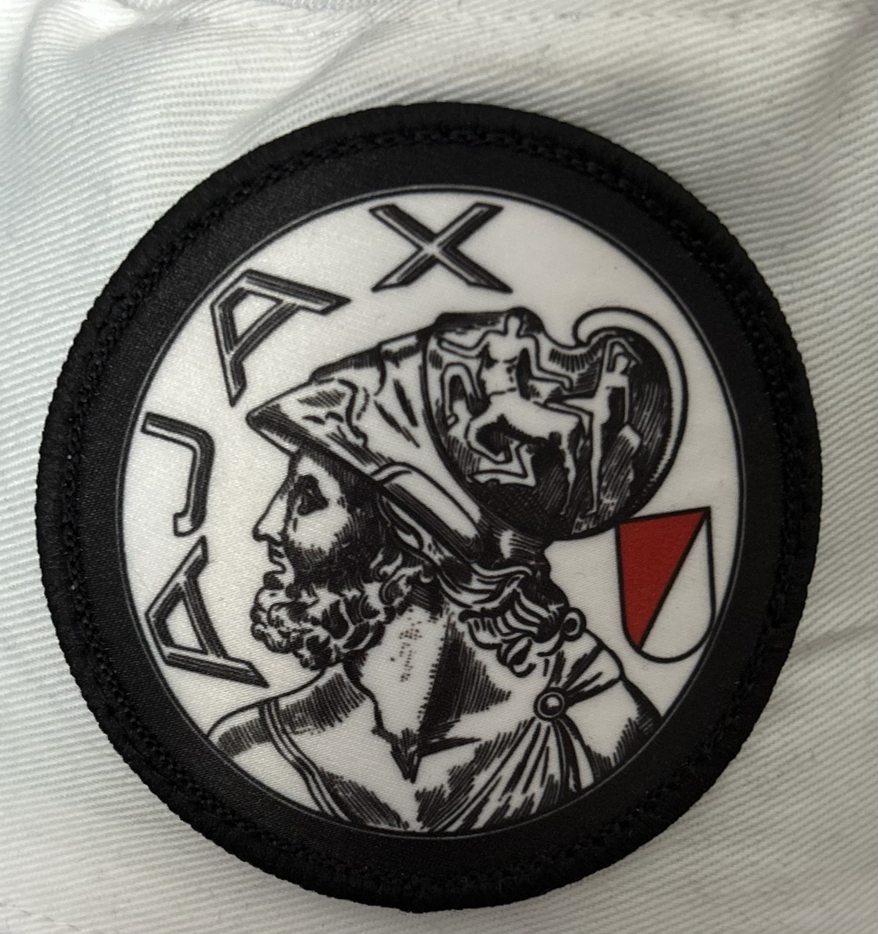 Vissershoedje oude logo wit