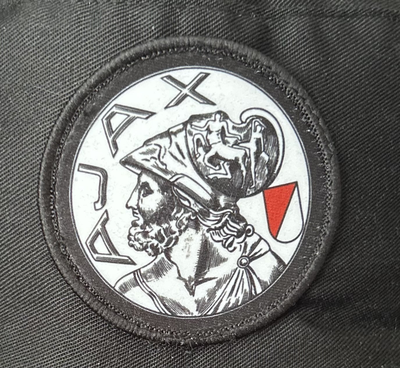 Vissershoedje oude logo zwart